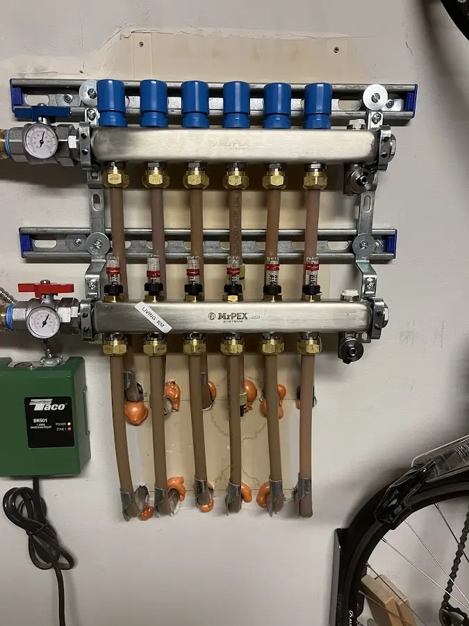 Plumber performing Water Heater Repair at a residential property in Manvel